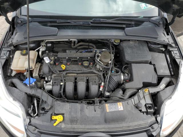 Photo 11 from auction – 2014 FORD FOCUS SE with VIN 1FADP3F21EL353236