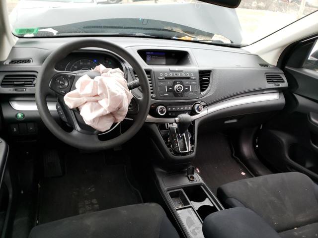 Photo 8 from auction – 2015 HONDA CR-V LX with VIN 2HKRM4H37FH697485