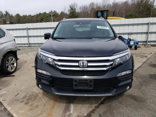 Photo 5 from auction – 2018 HONDA PILOT TOUR with VIN 5FNYF6H92JB066690