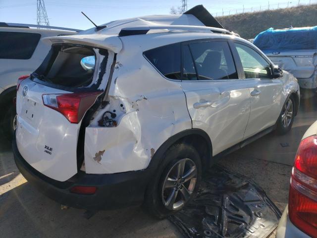 Photo 3 from auction – 2015 TOYOTA RAV4 XLE with VIN JTMRFREV1FD116825