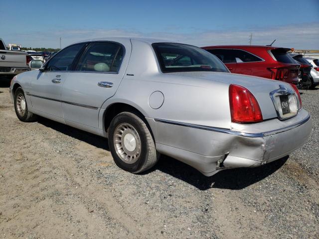 Photo 2 from auction – 2000 LINCOLN TOWN CAR E with VIN 1LNHM81W9YY787368