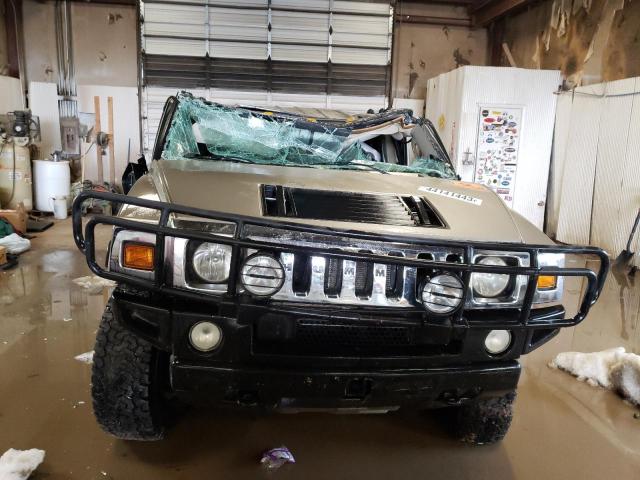 Фото 5 с аукциона – 2003 HUMMER H2 с VIN 5GRGN23U23H138038