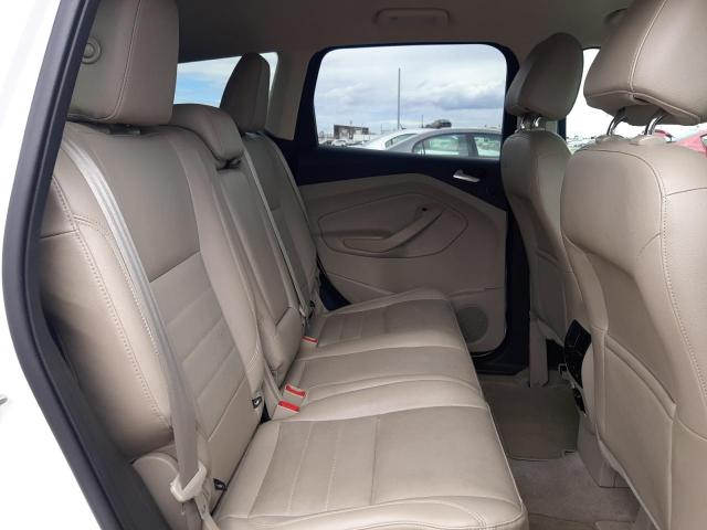 Photo 11 from auction – 2014 FORD ESCAPE TIT with VIN 1FMCU0JXXEUB01670