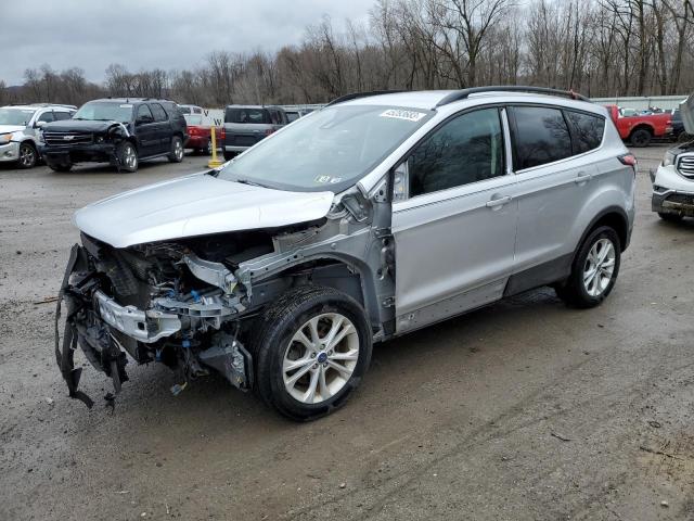 FORD ESCAPE SE 2018 with VIN 1FMCU9GD6JUC74212 - Photo from auction