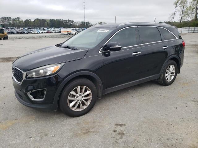 KIA SORENTO LX 2016 with VIN 5XYPG4A35GG081754 - Photo from auction