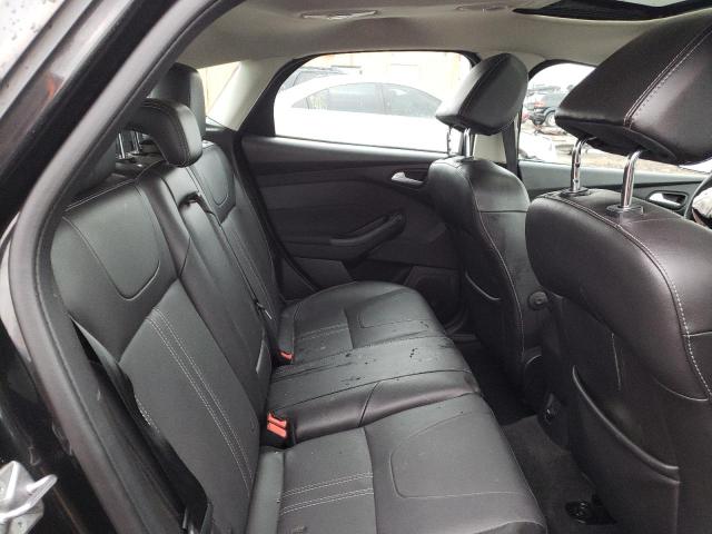 Photo 10 from auction – 2014 FORD FOCUS TITA with VIN 1FADP3N29EL353874