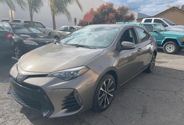 Photo 2 from auction – 2017 TOYOTA COROLLA L with VIN 5YFBURHE0HP672353