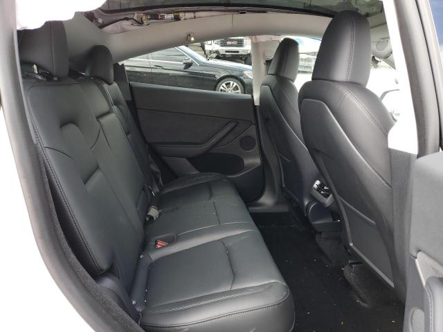 Photo 11 from auction – 2022 TESLA MODEL Y with VIN 7SAYGDEE9NA019908