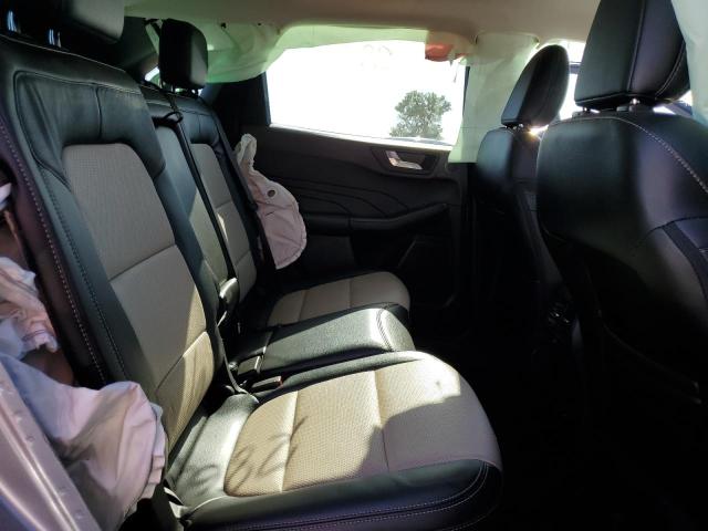 Photo 11 from auction – 2021 FORD ESCAPE TIT with VIN 1FMCU9DZ6MUA06555