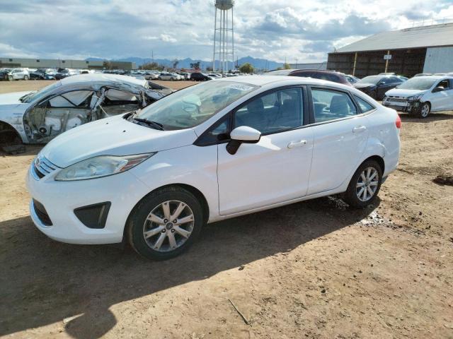 FORD FIESTA SE 2011 with VIN 3FADP4BJ3BM228915 - Photo from auction