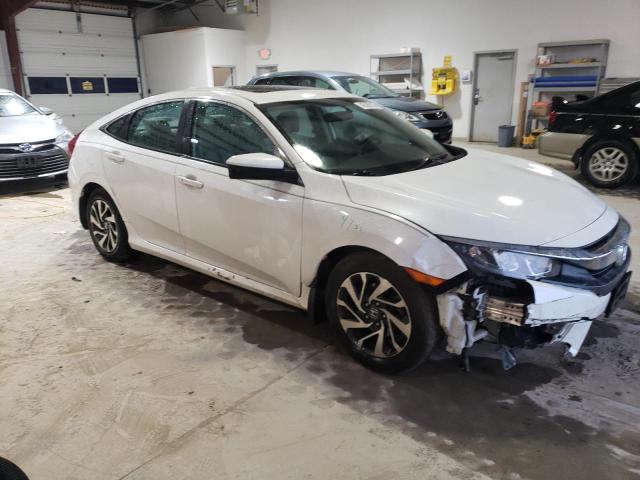 Photo 4 from auction – 2017 HONDA CIVIC EX with VIN 2HGFC2F7XHH545844