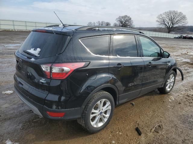 Photo 3 from auction – 2017 FORD ESCAPE SE with VIN 1FMCU9GD7HUD63412