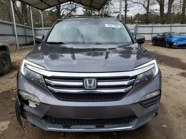 Photo 5 from auction – 2016 HONDA PILOT ELIT with VIN 5FNYF6H02GB014700