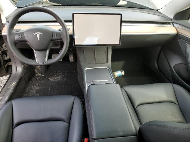 Photo 8 from auction – 2021 TESLA MODEL 3 with VIN 5YJ3E1EA1MF076890