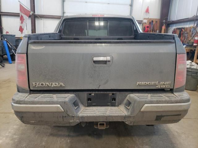 Photo 6 from auction – 2010 HONDA RIDGELINE with VIN 5FPYK1F54AB502476