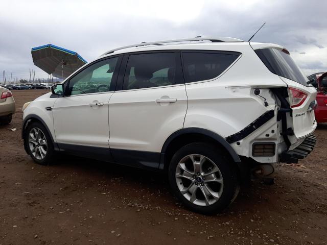 Photo 2 from auction – 2014 FORD ESCAPE TIT with VIN 1FMCU0JXXEUB01670