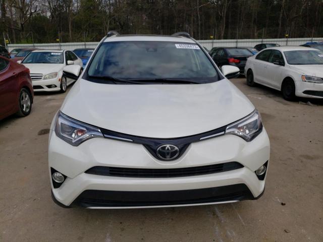 Photo 5 from auction – 2018 TOYOTA RAV4 LIMIT with VIN JTMYFREV7JJ749335