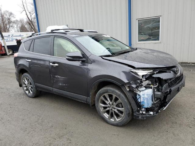 Photo 4 from auction – 2018 TOYOTA RAV4 LIMIT with VIN JTMDFREV8JJ177528