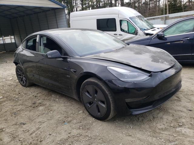 Photo 4 from auction – 2021 TESLA MODEL 3 with VIN 5YJ3E1EA2MF094539