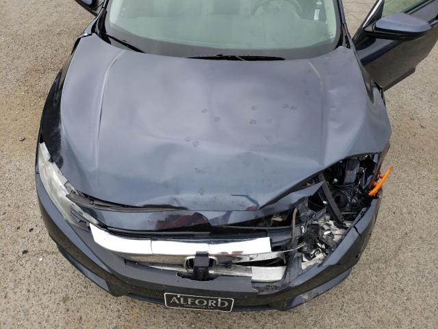 Photo 11 from auction – 2018 HONDA CIVIC LX with VIN 2HGFC2F56JH544002