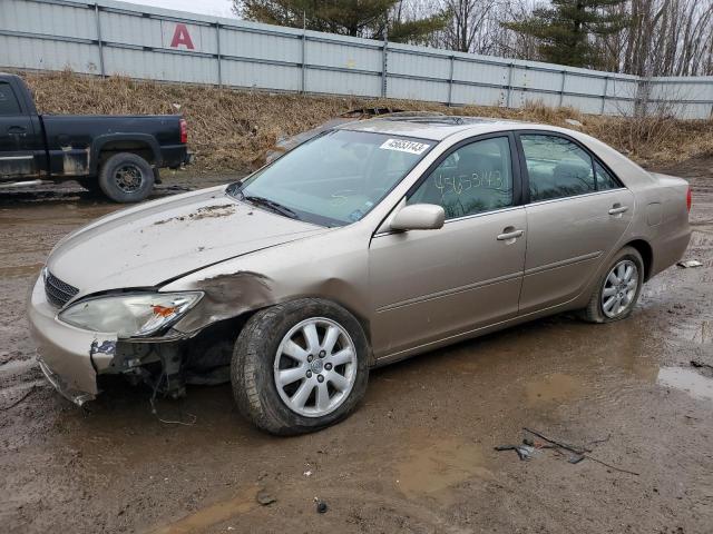 TOYOTA CAMRY LE 2003 with VIN 4T1BF30K03U059763 - Photo from auction