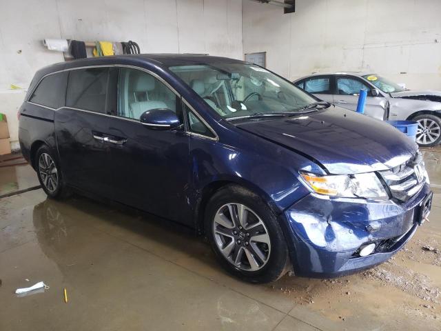 Photo 4 from auction – 2014 HONDA ODYSSEY TO with VIN 5FNRL5H94EB048642