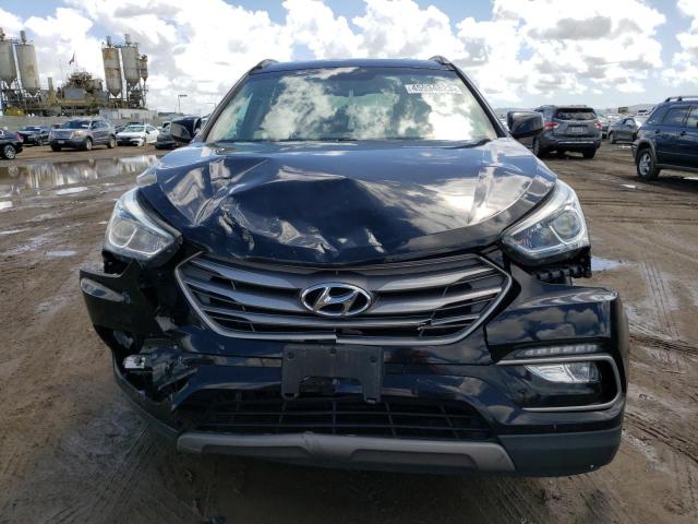 Photo 5 from auction – 2017 HYUNDAI SANTA FE S with VIN 5NMZU3LB3HH012665