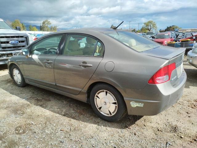 Photo 2 from auction – 2006 HONDA CIVIC HYBR with VIN JHMFA36226S025205