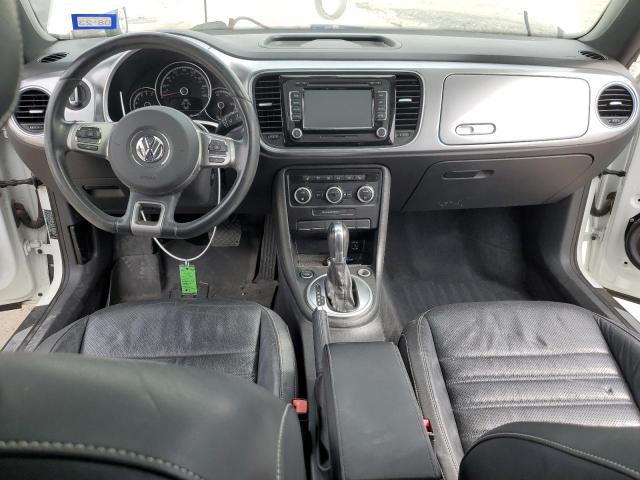 Photo 8 from auction – 2014 VOLKSWAGEN BEETLE with VIN 3VWJ17AT3EM655242