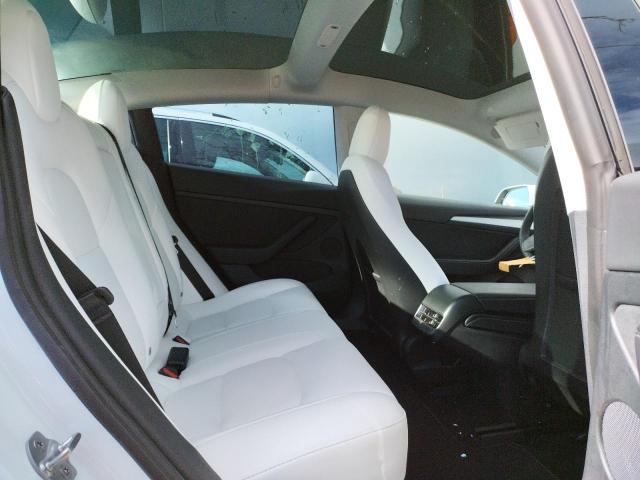Photo 10 from auction – 2021 TESLA MODEL 3 with VIN 5YJ3E1EC4MF980931