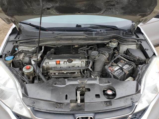 Photo 12 from auction – 2011 HONDA CR-V LX with VIN 5J6RE3H30BL012136