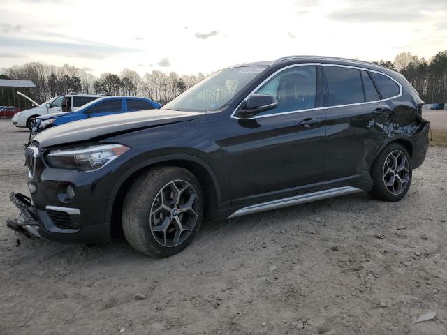 BMW X1 XDRIVE2 2019 with VIN WBXHT3C58K3H36131 - Photo from auction