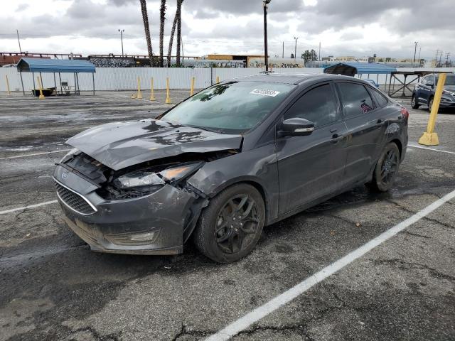 FORD FOCUS SE 2016 with VIN 1FADP3F29GL268440 - Photo from auction