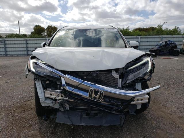 Photo 5 from auction – 2019 HONDA PILOT TOUR with VIN 5FNYF5H65KB011927