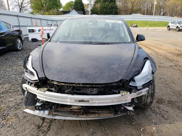 Photo 5 from auction – 2021 TESLA MODEL 3 with VIN 5YJ3E1EA9MF087894