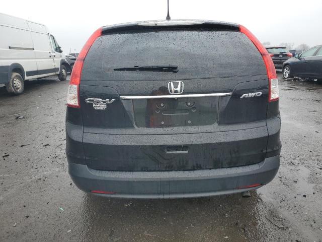 Photo 6 from auction – 2014 HONDA CR-V LX with VIN 2HKRM4H33EH680231