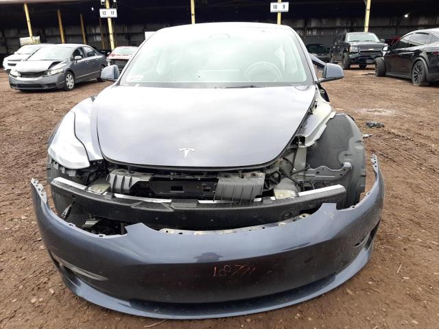 Photo 5 from auction – 2022 TESLA MODEL 3 with VIN 5YJ3E1EBXNF189831