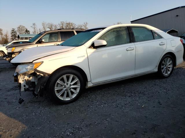 TOYOTA CAMRY HYBR 2014 with VIN 4T1BD1FK2EU108580 - Photo from auction