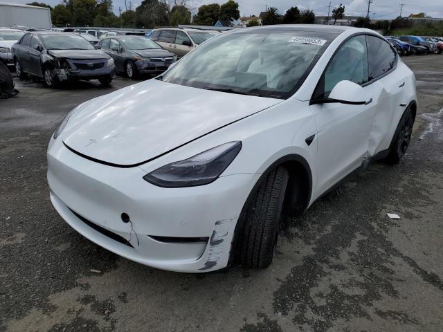 TESLA MODEL Y 2022 with VIN 7SAYGDEF0NF406536 - Photo from auction