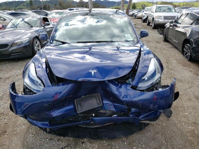 Photo 5 from auction – 2023 TESLA MODEL 3 with VIN 5YJ3E1EA6PF450382