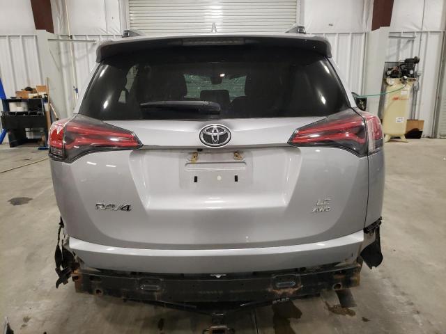 Photo 6 from auction – 2017 TOYOTA RAV4 LE with VIN 2T3BFREV6HW590342