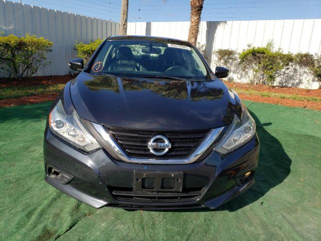 Photo 5 from auction – 2017 NISSAN ALTIMA 2.5 with VIN 1N4AL3AP4HC290459