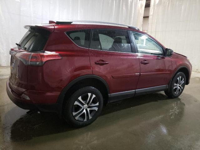 Photo 3 from auction – 2018 TOYOTA RAV4 LE with VIN 2T3BFREV3JW842876