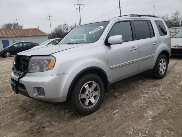 HONDA PILOT TOUR 2010 with VIN 5FNYF4H90AB036527 - Photo from auction