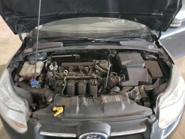Photo 11 from auction – 2014 FORD FOCUS S with VIN 1FADP3E24EL454062