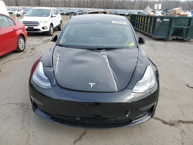 Photo 5 from auction – 2022 TESLA MODEL 3 with VIN 5YJ3E1EB5NF207474