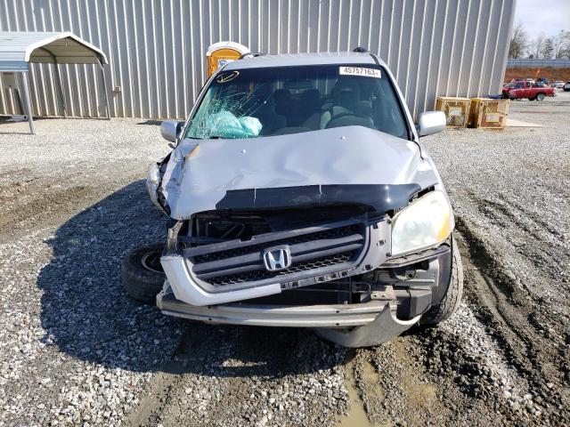 Photo 5 from auction – 2004 HONDA PILOT with VIN 2HKYF18404H539287