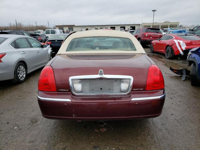 Photo 6 from auction – 2004 LINCOLN TOWN CAR E with VIN 1LNHM81W24Y609988