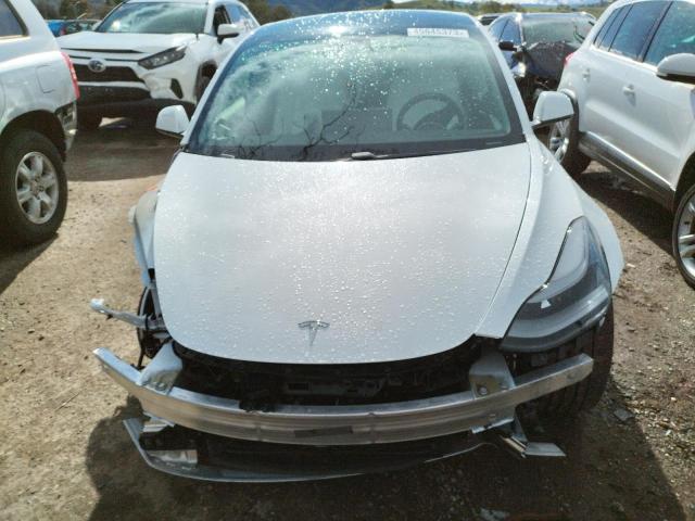 Photo 5 from auction – 2021 TESLA MODEL 3 with VIN 5YJ3E1EC4MF980931
