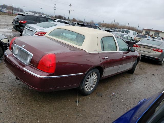 Photo 3 from auction – 2004 LINCOLN TOWN CAR E with VIN 1LNHM81W24Y609988